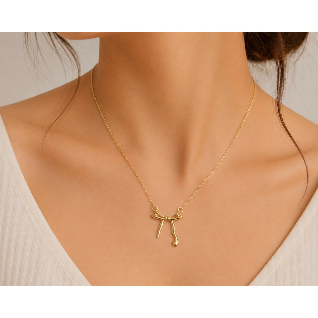 Sylvera Bow Charm